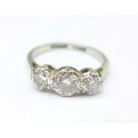 A platinum set three stone diamond ring, over 1carat total diamond weight, 3g, M, (no paperwork)