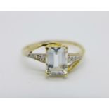 A 9ct gold ring, with white centre stone and diamond set shoulders, 1.2g, O