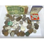 A collection of crowns, coins and banknotes