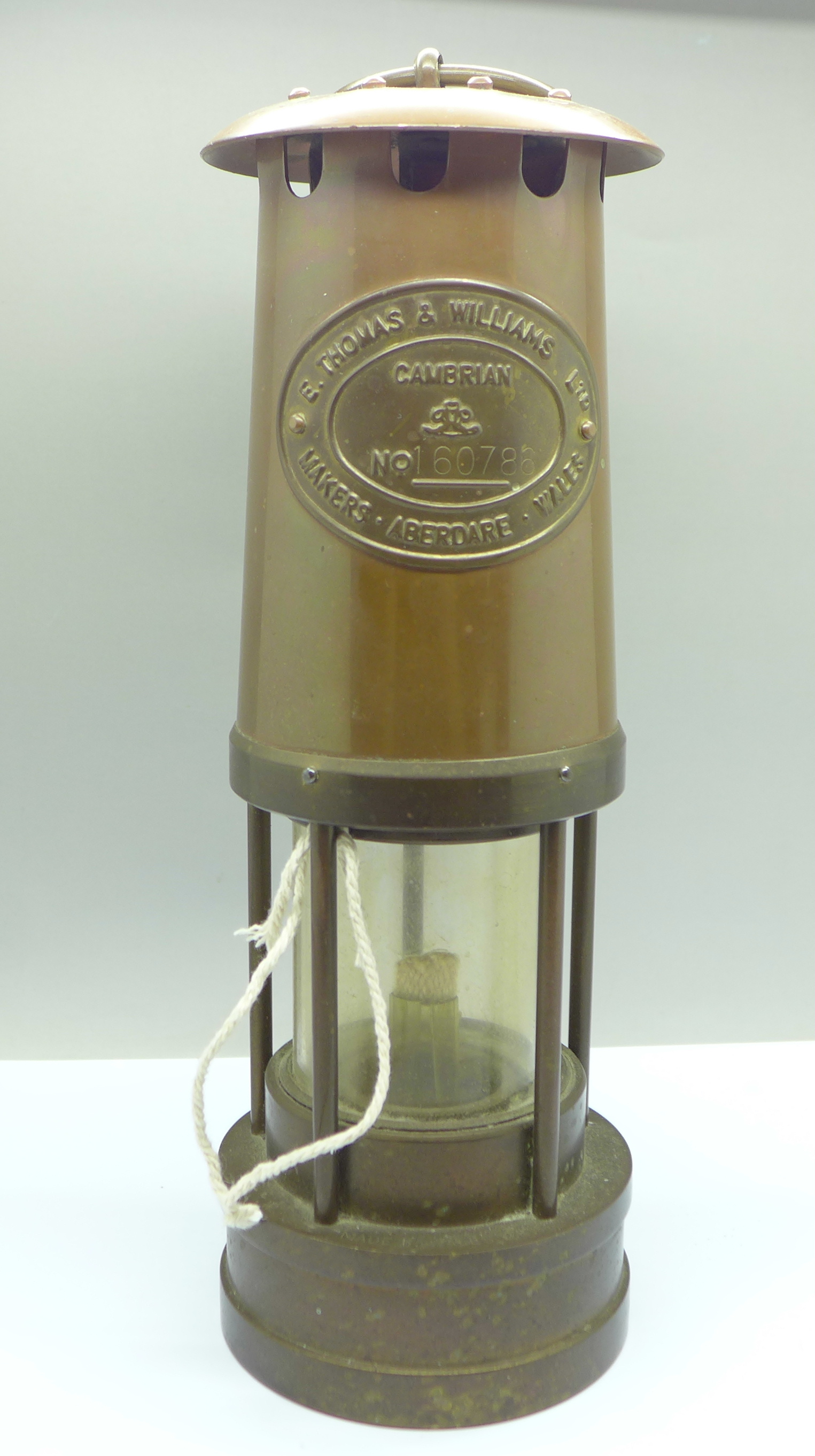 An E. Thomas & Williams Ltd. miner's safety lamp, No. 160786, with certificate,