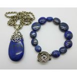 A lapis lazuli pendant set in silver and on a silver rope chain, 44cm, and a lapis lazuli bracelet