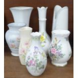 Eight vases including Royal Doulton, Wedgwood, Coalport, Denby and Royal Albert