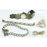 Two silver bracelets, a silver watch bracelet strap, a coin bracelet and a silver necklace