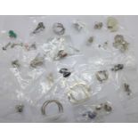 Twenty-five pairs of silver and silver mounted earrings