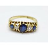 An 18ct gold, blue and white stone ring, 3.8g, O