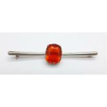 A yellow and white metal set fire opal brooch, 4.9g