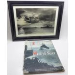 A framed photograph of Malta Escort and a East of Malta, West of Suez booklet