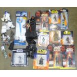 A collection of Star Wars die-cast figures in blister packs from Episode One and other figures