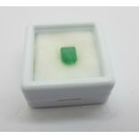 An unmounted emerald stone, approximately 1.55carat weight and 7mm x 5.5mm
