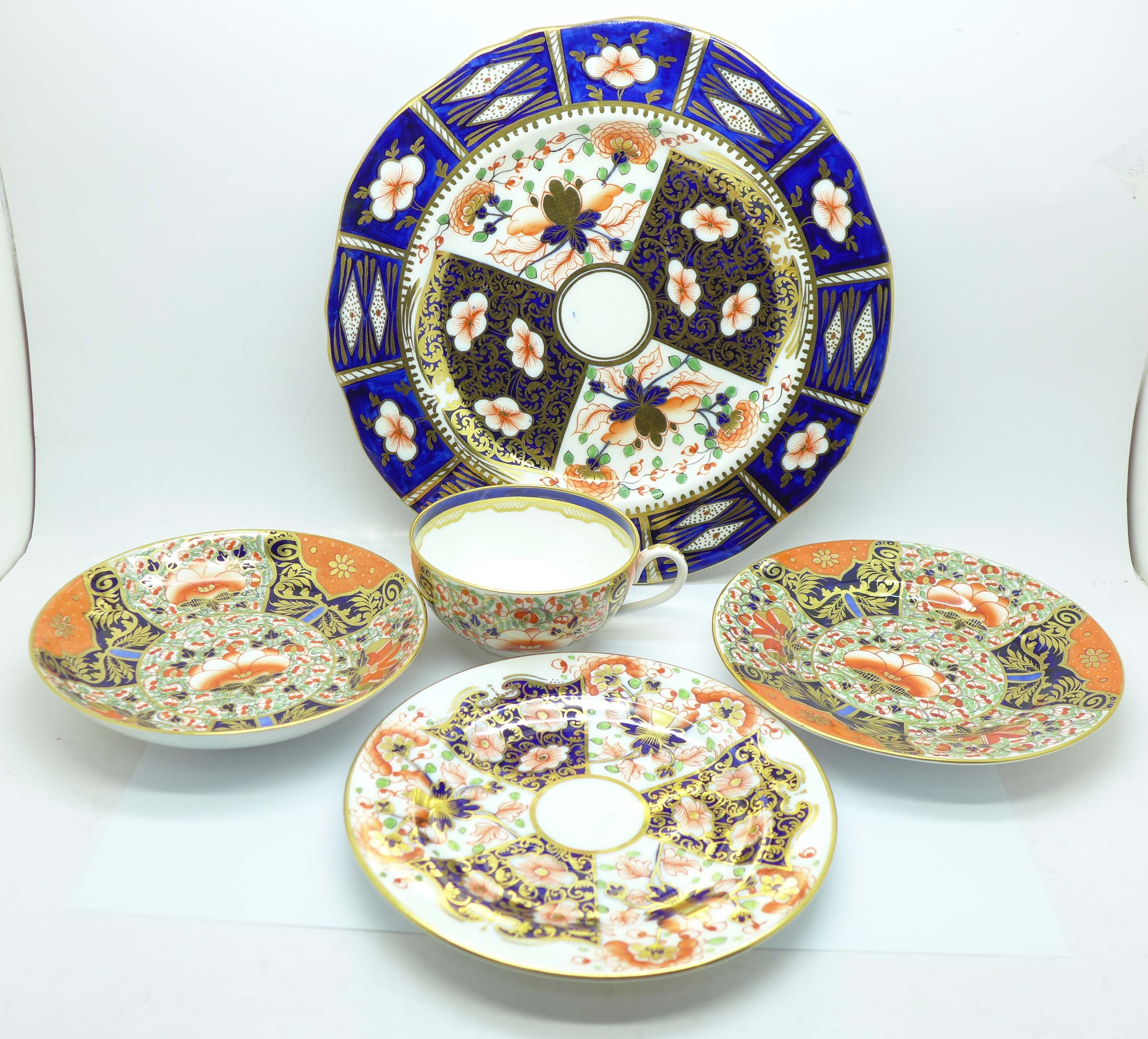A Derby S & Hancock trio, (plate, cup and saucer), circa 1861, and two S & Hancock plates, 23 and