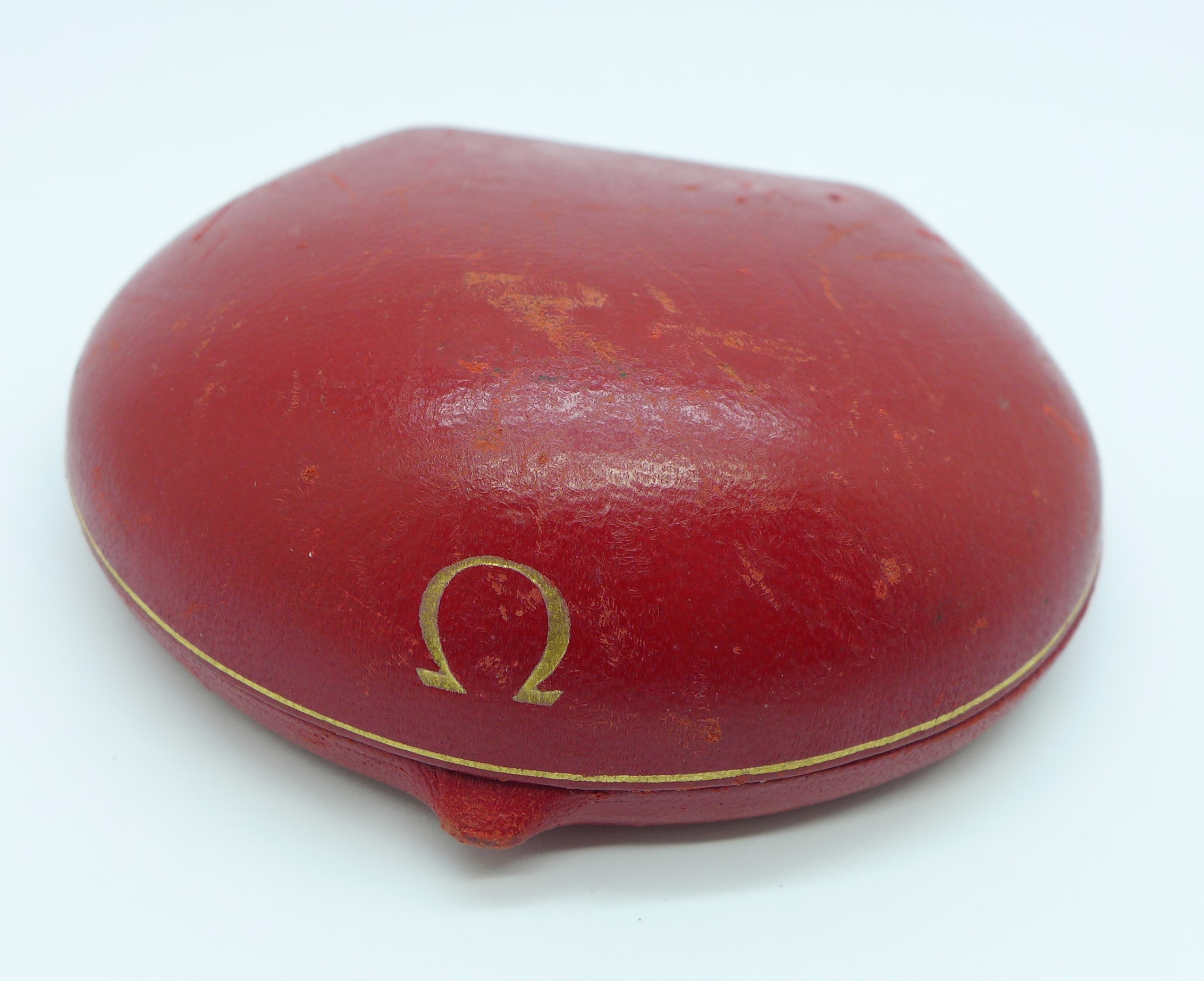 A lady's Omega clam shell wristwatch box