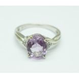 A 9ct white gold and amethyst ring with diamond shoulders, 2.8g, O