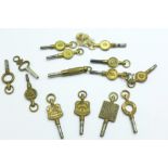 Four advertising pocket watch keys and ten other pocket watch keys