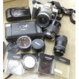 Cameras including a Canon Sure Short 35mm, Polaroid Vision camera, Minolta, filters and lens, etc.