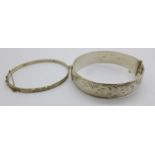 Two silver bangles, 55g