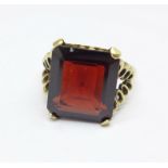 A 9ct gold and garnet ring, 3.7g, L
