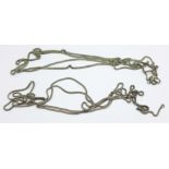 Two white metal guard chains, a/f