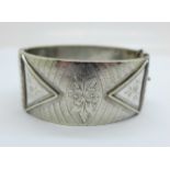 A Victorian bangle, marked 'silver band'