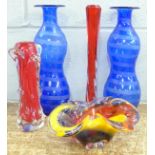 A pair of blue glass vases and three other art glass vases