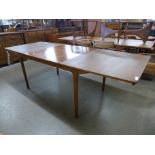 A McIntosh teak double extending dining table