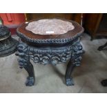 A Chinese marble topped padouk jardiniere stand, 39cms h