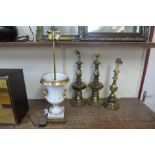 Three brass table lamp bases and one other