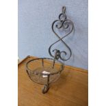 A wrought iron wall bracket