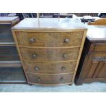 A burr walnut bow front chest of drawers