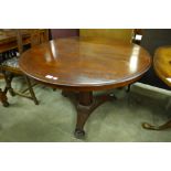 A Victorian mahogany circular breakfast table