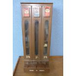 A vintage steel cigarette vending machine