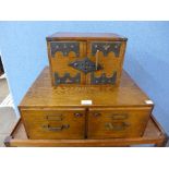 A set of oak index drawers and a small oak desk top cabinet