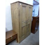 A Victorian style pine housekeepers cupboard, 171cms h, 98cms w, 52cms d