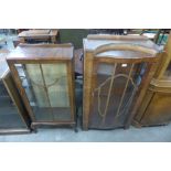 Two walnut display cabinets