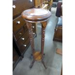 A mahogany barleytwist jardiniere stand