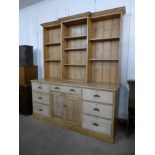 A Victorian style pine country house bookcase, 228cms h, 194cms w, 62cms d