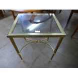 An Italilan glass topped brass occasional table