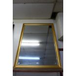 A gilt framed mirror