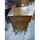 A walnut drop-leaf pot cupboard