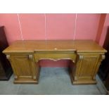 A Victorian oak breakfront serving table