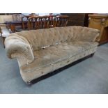 A Victorian mahogany and upholstered Chesterfield settee