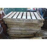 Eight wooden potato crates