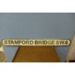 A painted Stamford Bridge street sign