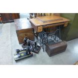 A Jones treadle sewing machine base and two Singer sewing machines