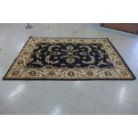 A black and cream ground rug