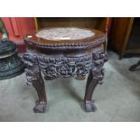 A Chinese marble topped padouk jardiniere stand, 39cms h