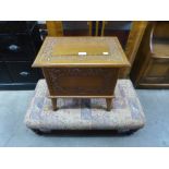 A carved beech sewing box and a stool