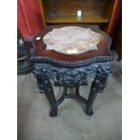 A Chinese marble topped padouk jardiniere stand, 58cms h