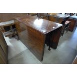 A mahogany drop-leaf table