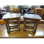 A pair of oak stools