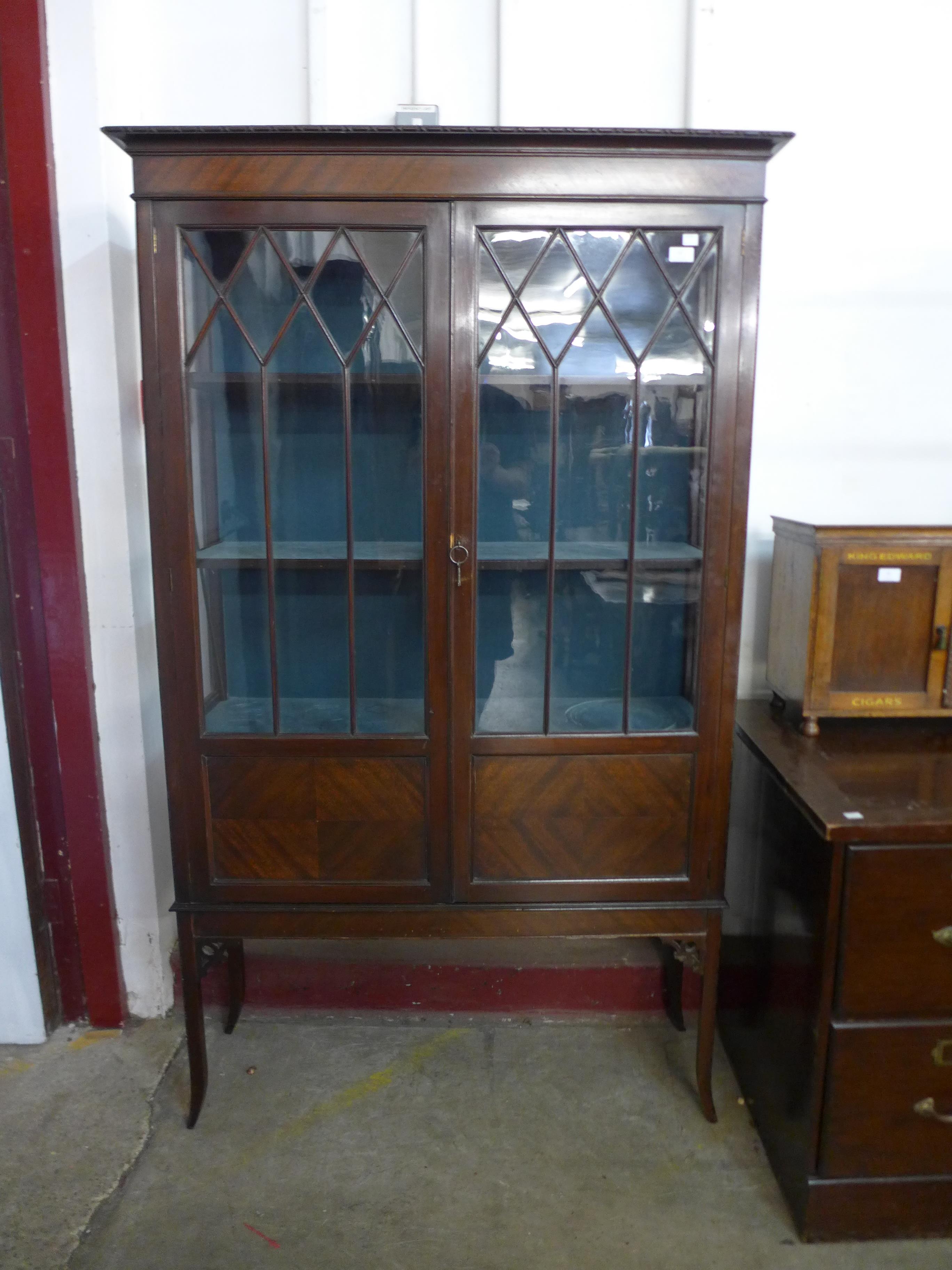 An Edward VII mahogany two door display cabinet